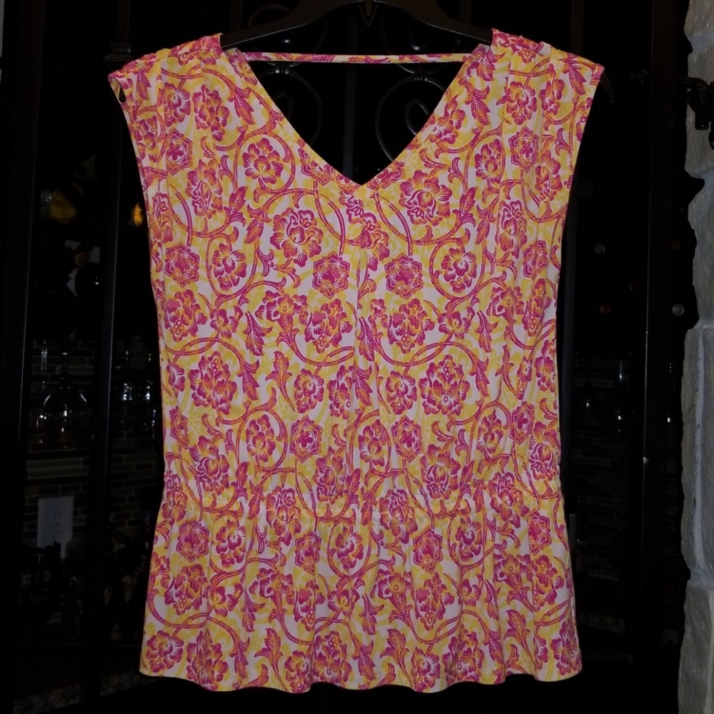 Elastic waist peplum style top!